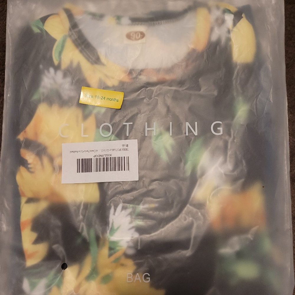 Size 18 months sunflower pants and shirt set.